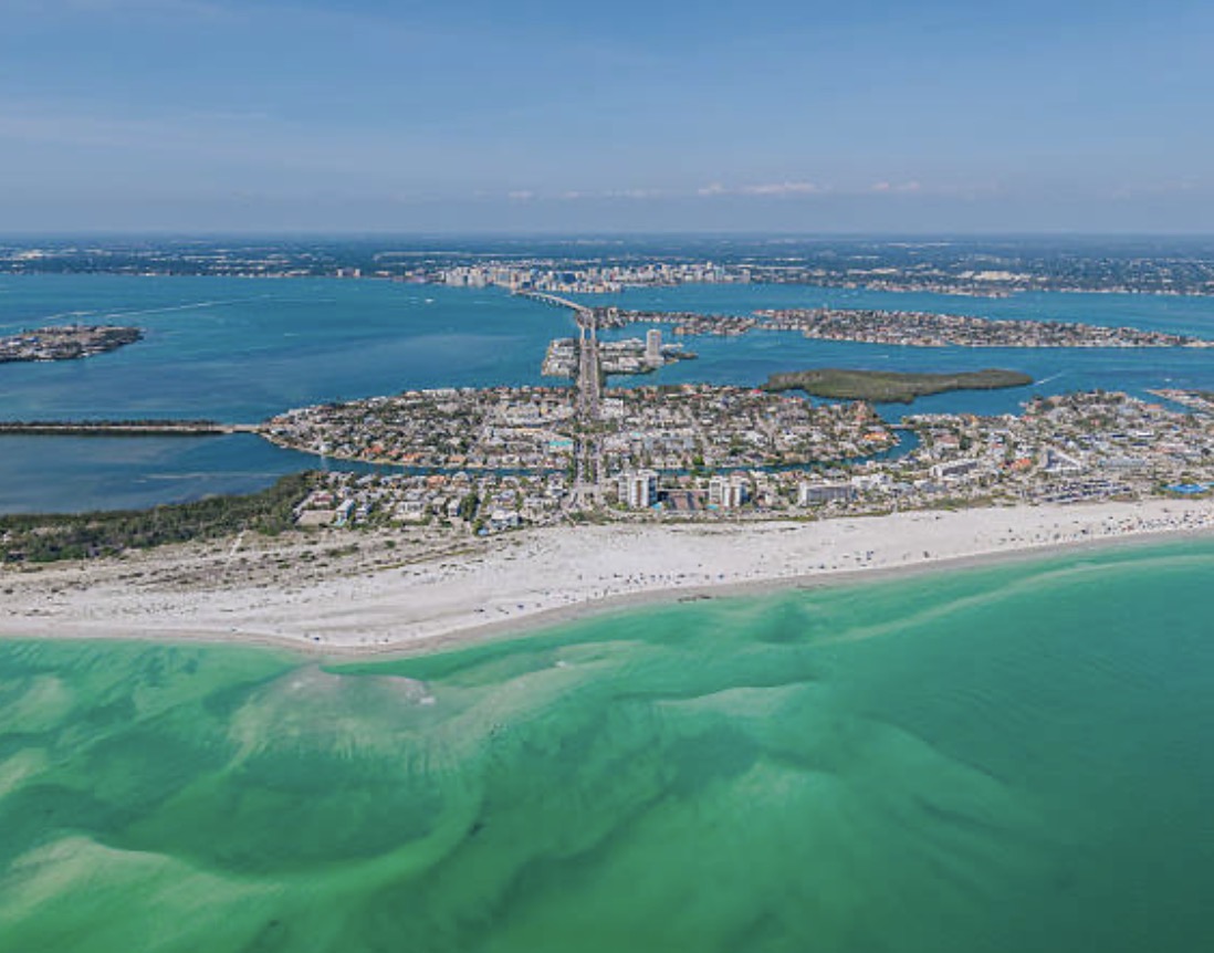 Aerial view of Sarasota barrier islands including Anna Maria Island Longboat Key and Bird Key Gulf Coast luxury waterfront real estate