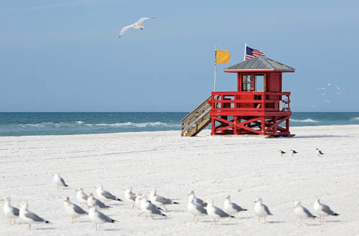 Siesta Key Beach red lifeguard stand white sand Sarasota Florida